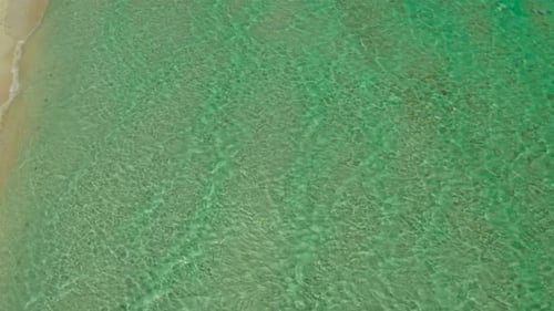 Ocean with Waves and Yellow Beach