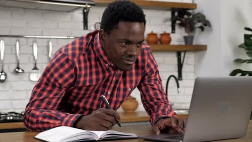Close Up Smiling African American Man Student Study Does Homework Using Laptop
