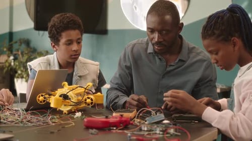 School Kids at Robotics Class with Teacher