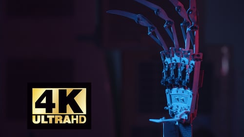 Robot Hand Spinning With Red And Blue Light