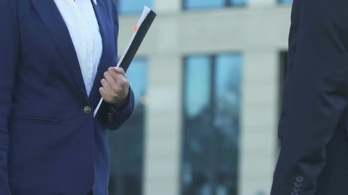 Business Handshake Outdoors in Urban Setting