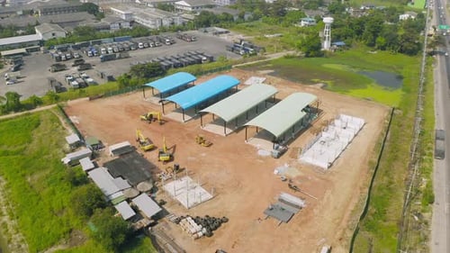 Aerial top view of abandoned industry or factory under construction site with structure