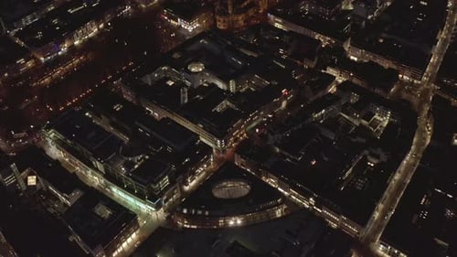 High Angle View of Blocks of Buildings Divided By Streets in Modern Urban Borough at Night