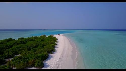 Aerial flying over abstract of idyllic island beach holiday by blue sea and white sandy background o