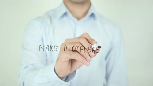 Writing 'Make a Difference' on Glass Surface