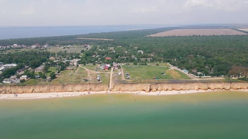 Sandy Beach with a Cliff