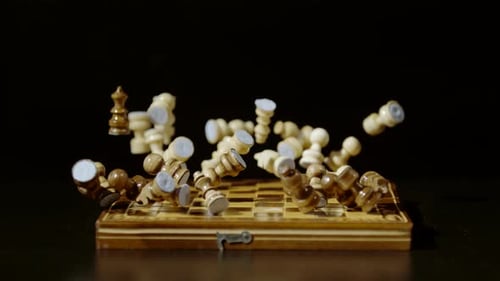 Chessboard and Pieces Bouncing in Slow Motion