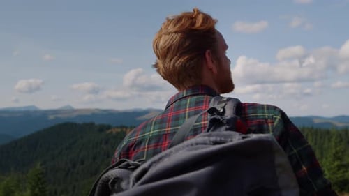 Man Hiking, Looking at Mountain Vista