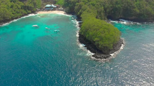 Aerial Shot of a Fantastic Blue Lagoon Beach on the Bali Island with a Crystal Clear Blue Water
