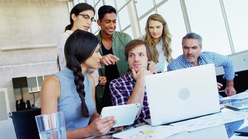 Team Collaborating in a Bright Modern Office