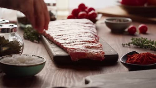Woman Chef Cooking Ribs Closeup
