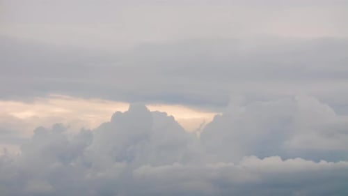 Fluffy White Clouds Moving Fast in Time-lapse. Evening, Cloudy Heaven Background. Timelapse of