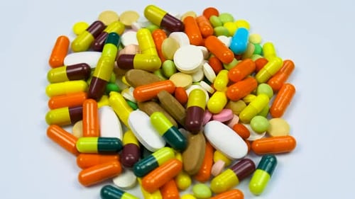 Pile of Multicolored Pills and Capsules