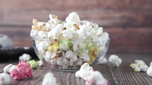 Close Up of Popcorn and Tv Remote on Table