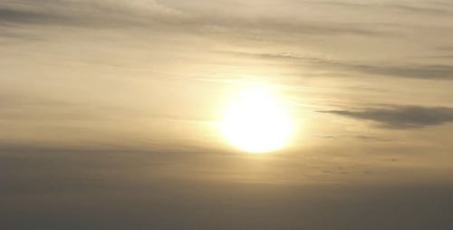 Floating Clouds At Sunset
