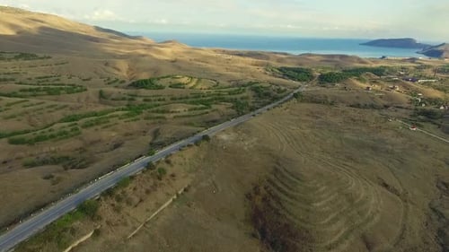 Desert And The Road Surrounded By Sea