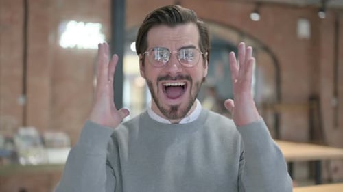 Man Yelling then Composing Himself Indoors