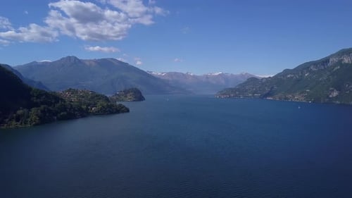 Aerial Flying Over Mountain Lake Como in North of Italy, Lot of Lakeside Villages, Sunny Weather