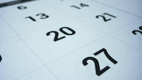 Business Working Day Calendar. Woman Marking Day on Calendar with Marker