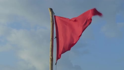 Red Flag Waving in the Wind, Beachside Warning