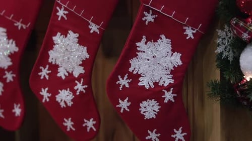 Christmas Stockings With Snowflakes and Holiday Wreath