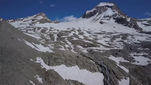 Aerial View of Snow-Capped Mountains in Daytime