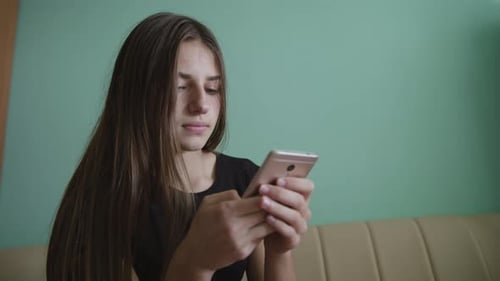 Teen Using a Smartphone