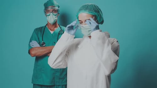 Medical Staff Preparing for Work in Hospital Setting