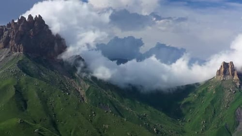 Mountain Aerial View with Dramatic Rolling Green Hills