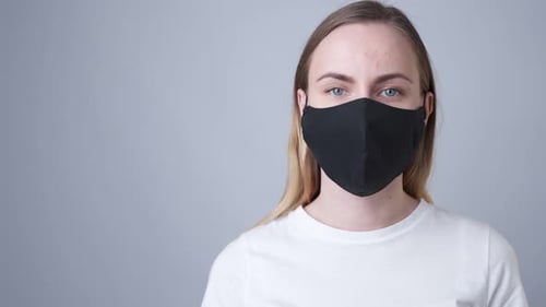Woman Wearing Protective Mask and White T-Shirt