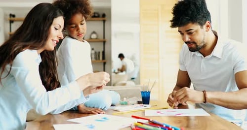 Family Drawing Together at Home