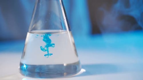 Chemical Test in Laboratory, Scientist Performing Chemical Liquid Test in Laboratory
