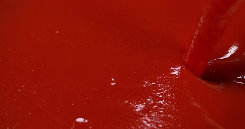Pouring Fresh Tomato Sauce Close Up