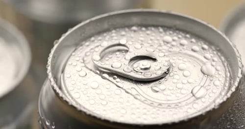 Icy Beverage Can with Condensation Close-Up