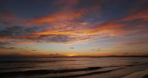 Ocean Beach at Sunset with Dramatic Clouds