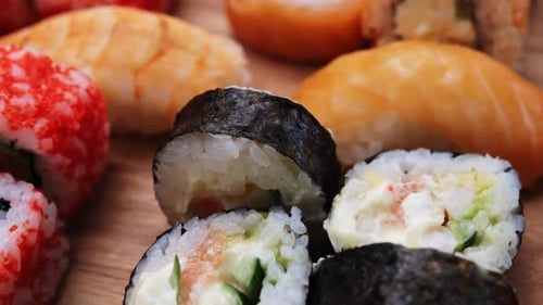 Sushi Rolls Display with Salmon and Tobiko