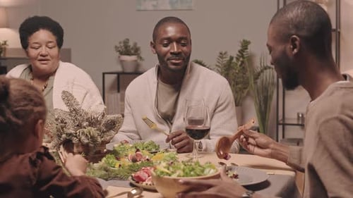 Family Celebrates Holidays with a Festive Meal Together