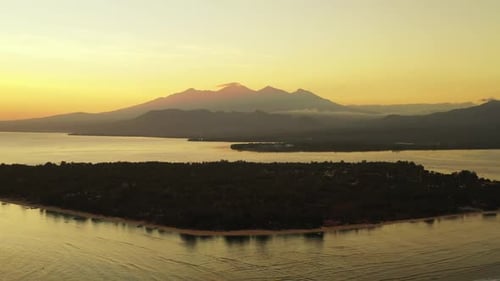 Aerial top down scenery of idyllic sea view beach wildlife by clear sea and white sandy background o