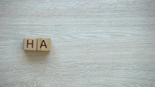 Spelling Handmade with Wooden Blocks on a Table