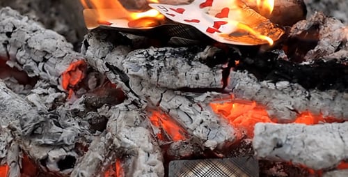 Cards Are Burned In The Fire