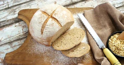 Sliced Sourdough Bread on Cutting Board Still Life