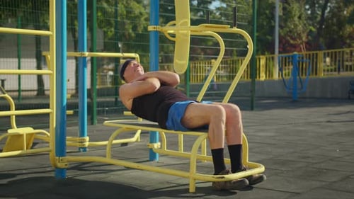 Active Senior Elderly Old Caucasian Man Do Physical Exercises in Sport Playground. Fitness Leisure