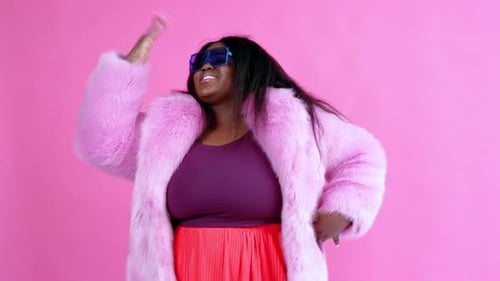 Woman in Pink Fur Coat Dancing