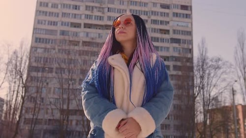 Stylish Woman in Trendy Outfit Standing on Street