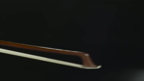 Cello Musical Instrument Close Up Bowing on Strings