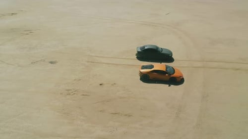 Racing Footage Aerial Around Modern Design Sport Cars Ready for Desert Racing