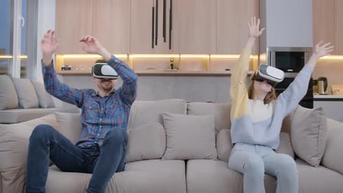 Couple Experiences Virtual Reality Together at Home