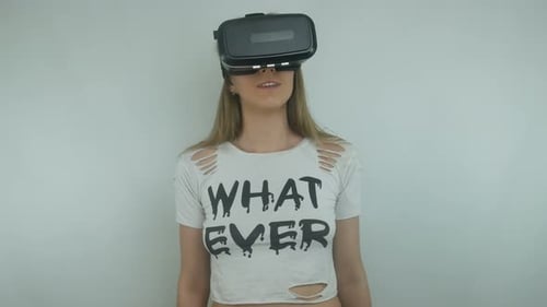 Woman with VR Headset Exploring Virtual Reality