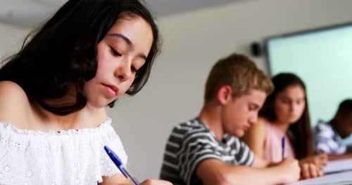 Schoolgirl studying in classroom 4k