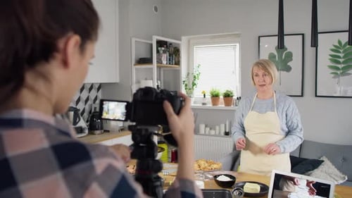 Filming a Baking Tutorial in a Modern Kitchen